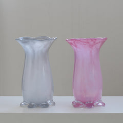 Floor-to-ceiling glass vase